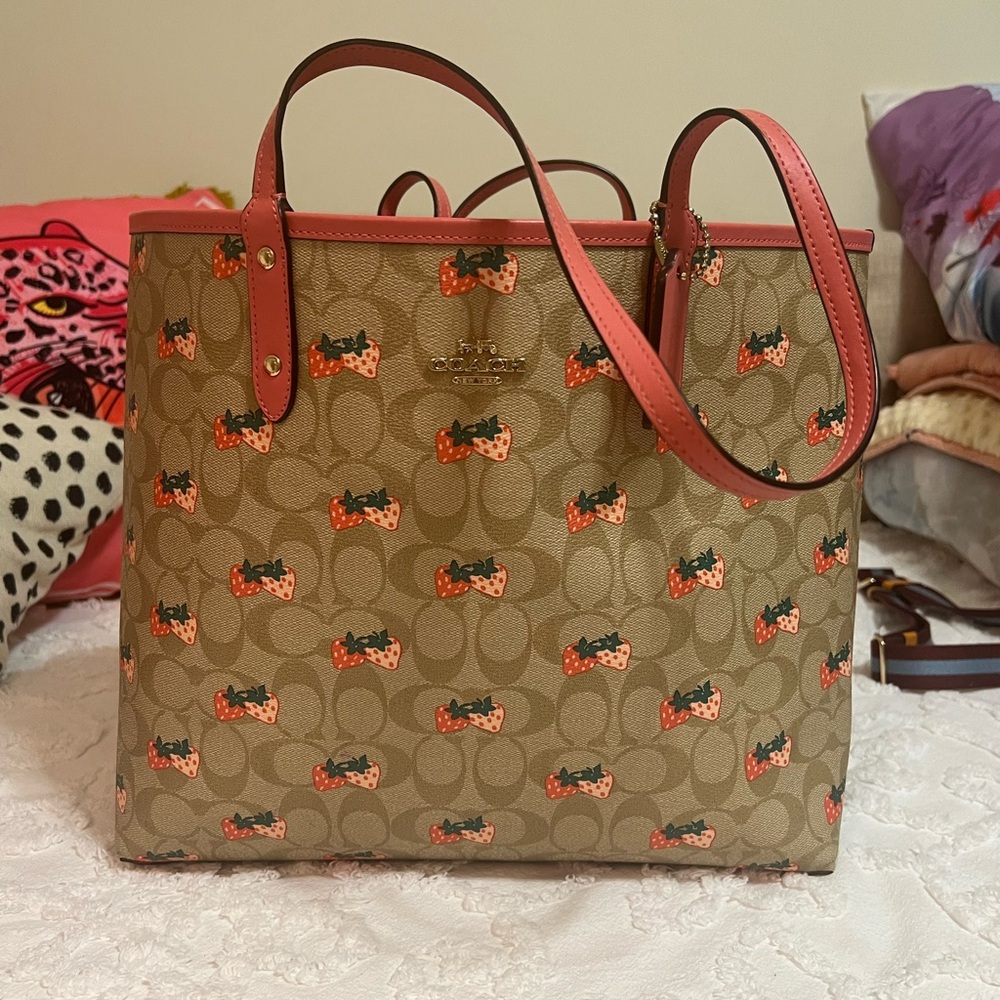 Reversible strawberry/ pink Coach bag